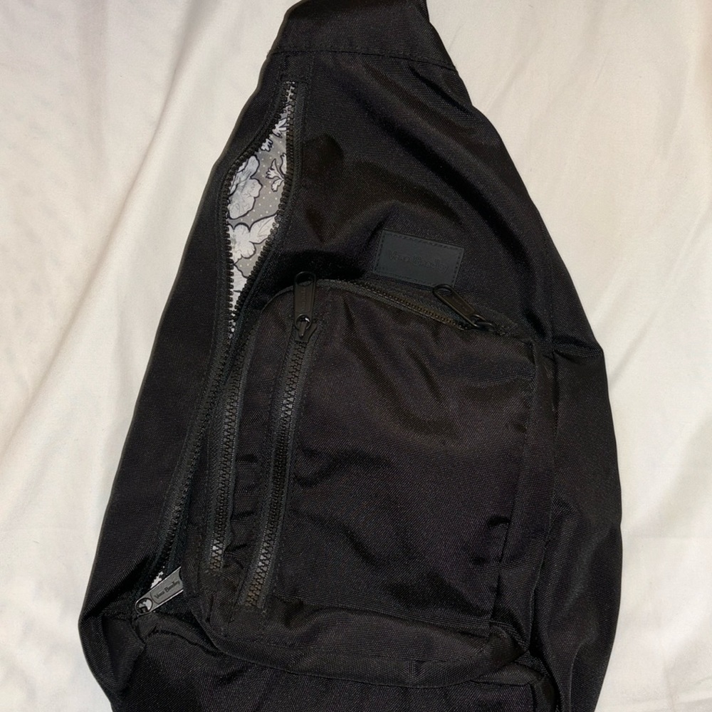 A black Very Bradley side bag in perfect condition.